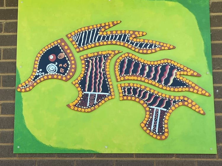 a large Indigenous Mural of an Echidna which is displayed on one of the exterior walls in our school.